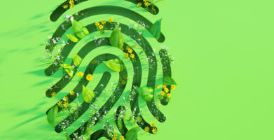 Green fingerprint shape with leaves and flowers.